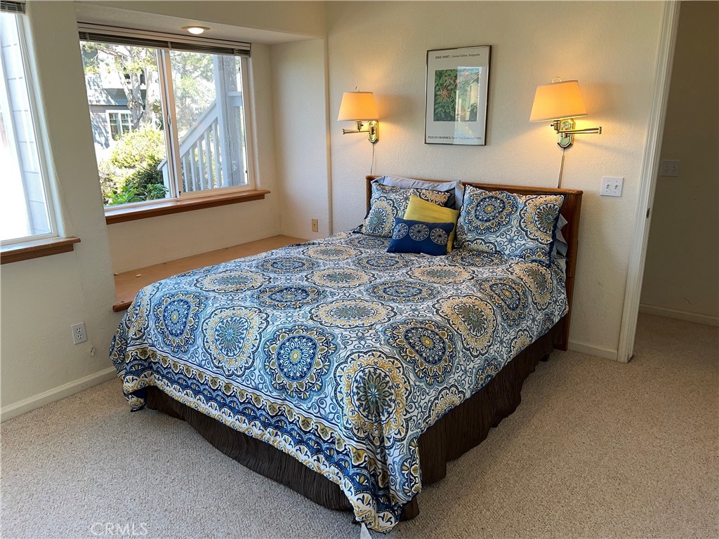 330 Jean Street Cambria, CA 93428 - Photo 44 of 75 a bedroom with a bed and window