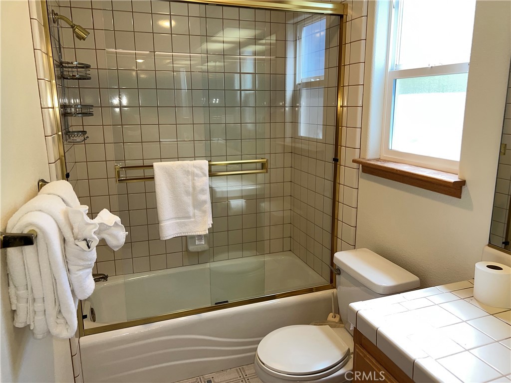 330 Jean Street Cambria, CA 93428 - Photo 49 of 75 a bathroom with a toilet and shower