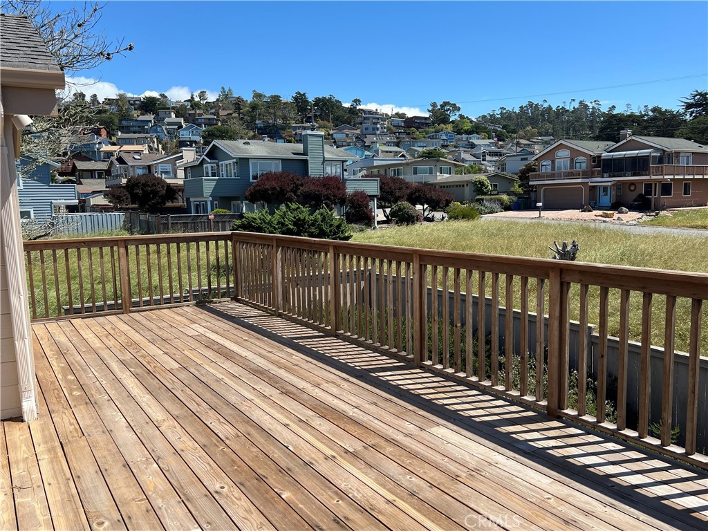 330 Jean Street Cambria, CA 93428 - Photo 52 of 75 a view of a balcony with wooden floor