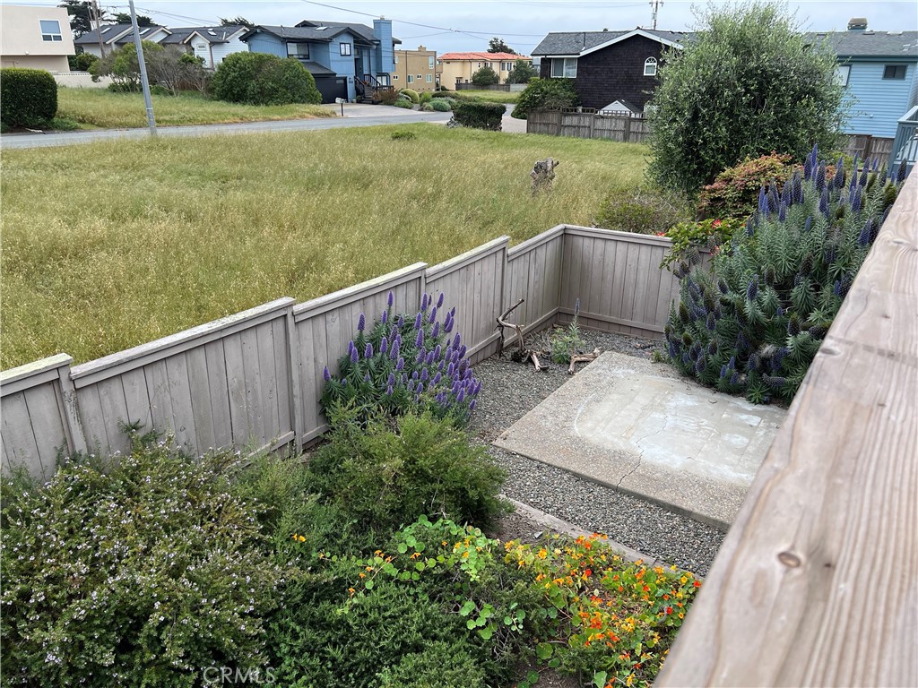 330 Jean Street Cambria, CA 93428 - Photo 56 of 75 a view of a garden from a balcony