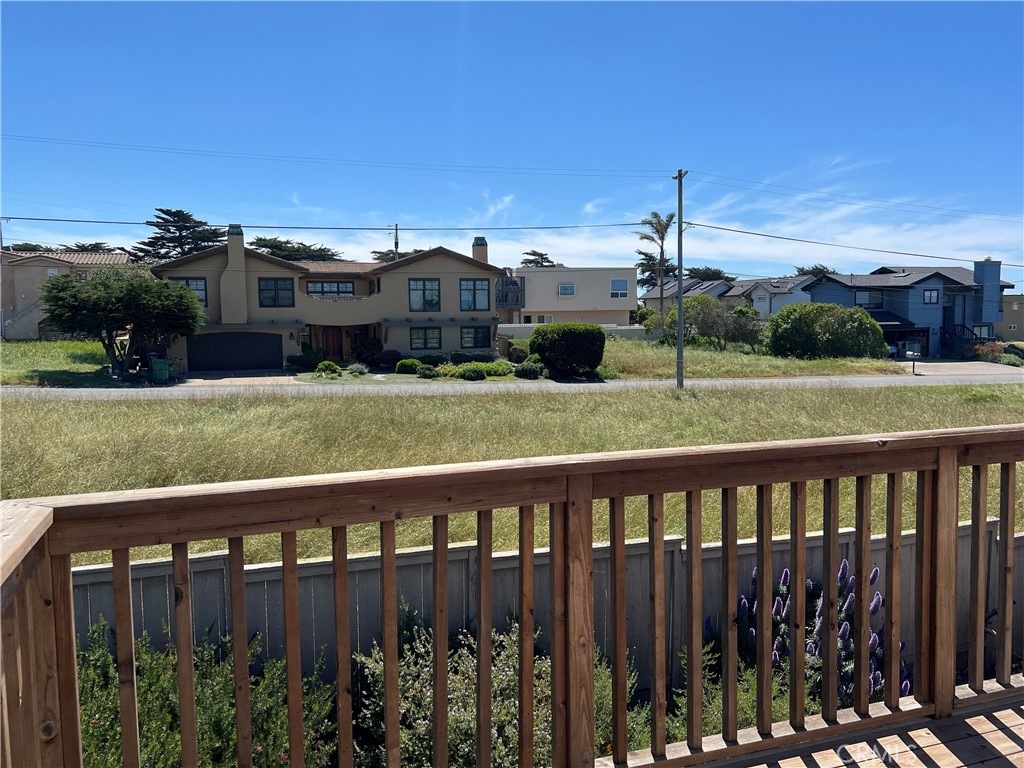 330 Jean Street Cambria, CA 93428 - Photo 57 of 75 a view of a house with a yard from a balcony