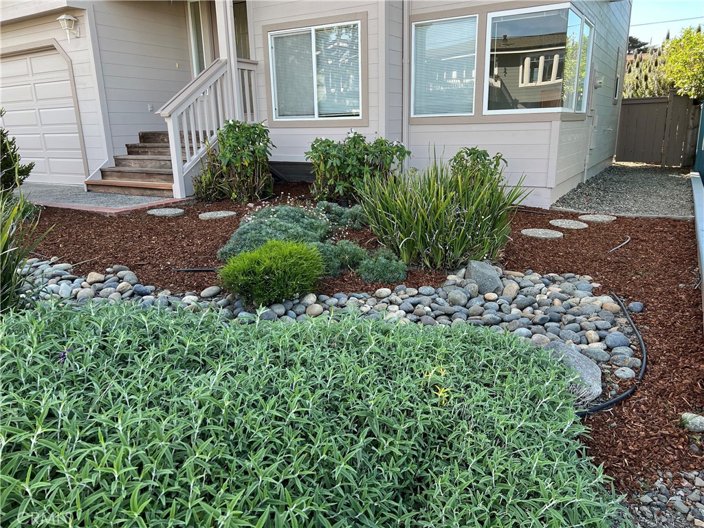 330 Jean Street Cambria, CA 93428 - Photo 7 of 75 a view of a house with a yard