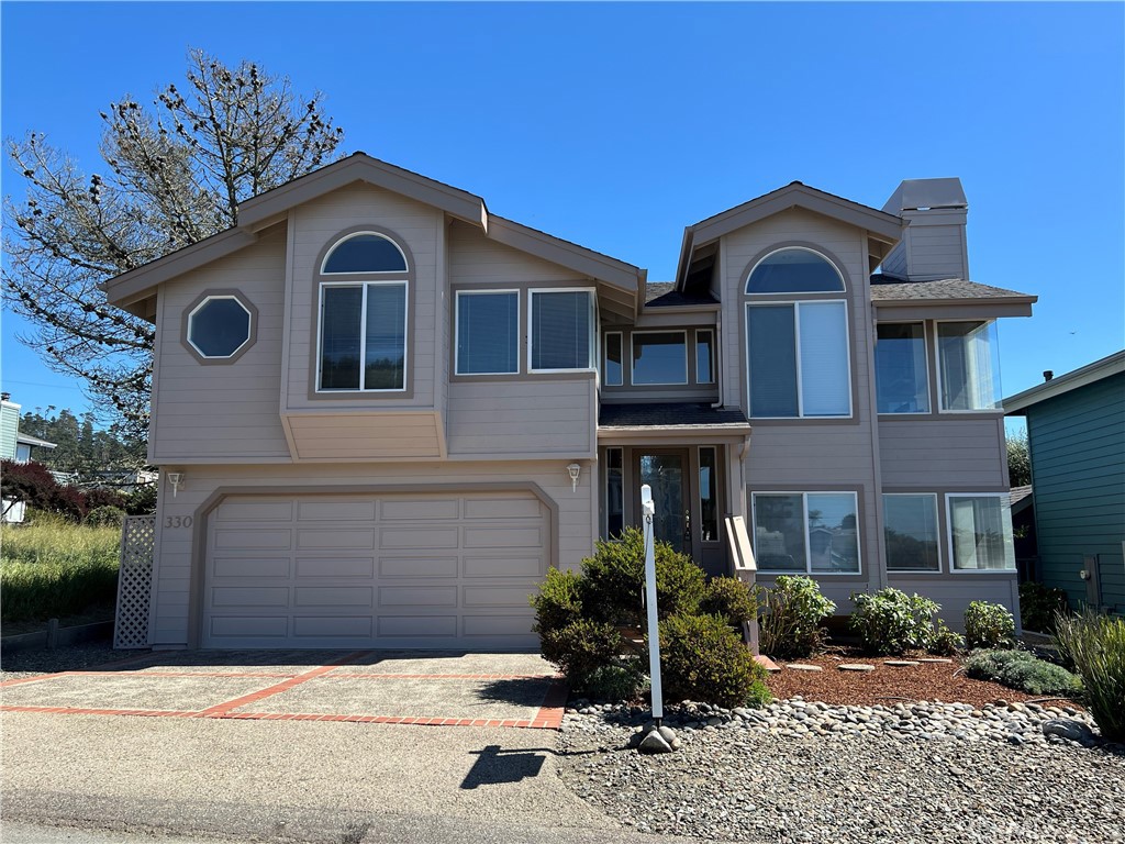 330 Jean Street Cambria, CA 93428 - Photo 75 of 75 a front view of a house with garden