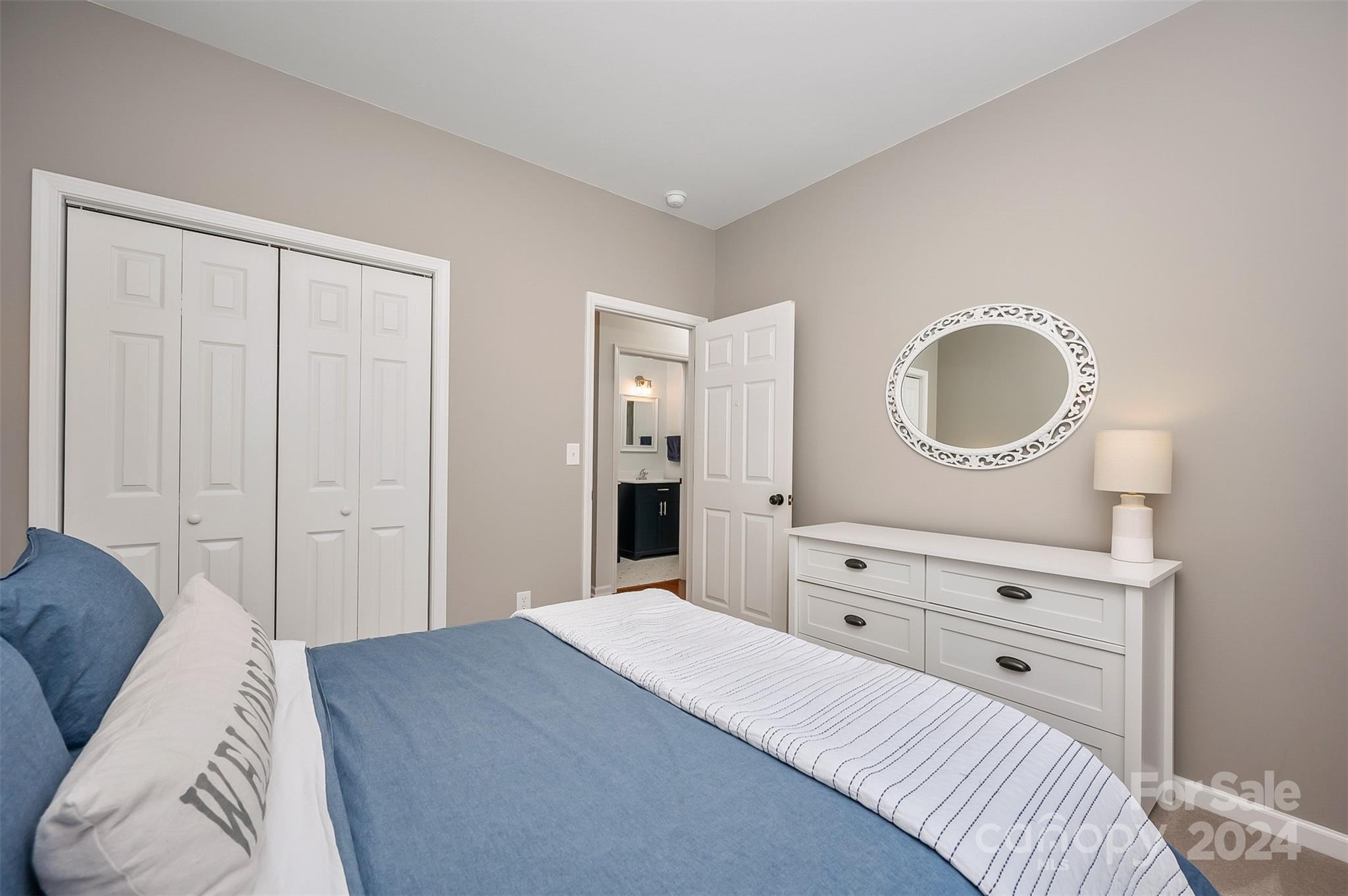 136 General Griffith Circle Rutherfordton, NC 28139 - Photo 18 of 47 a bedroom with a bed and a dresser
