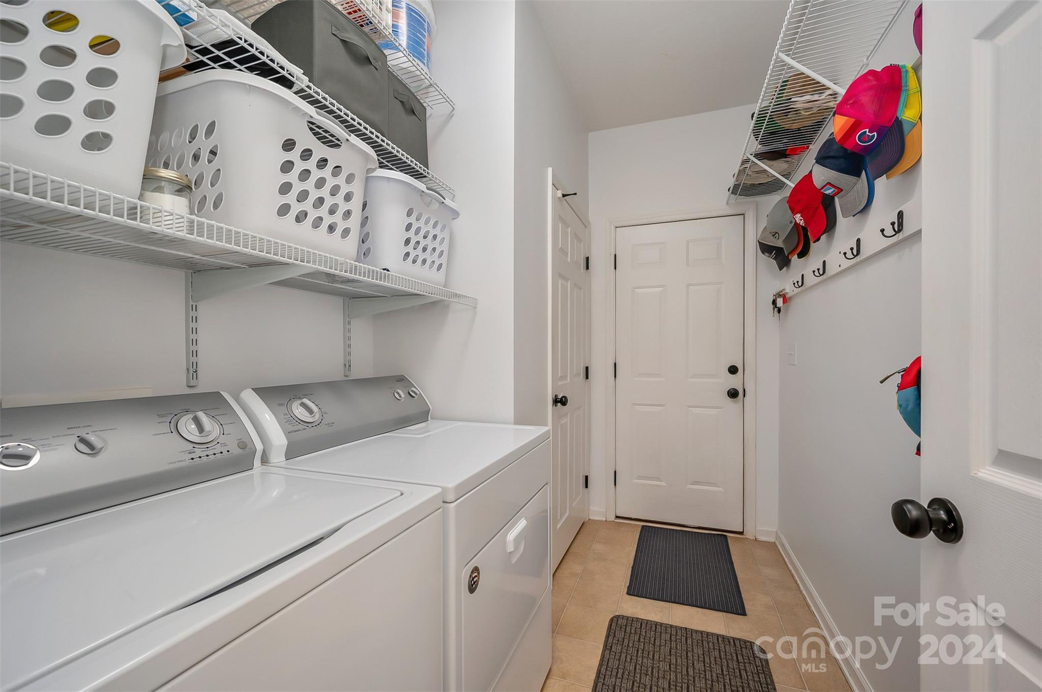 136 General Griffith Circle Rutherfordton, NC 28139 - Photo 23 of 47 a utility room with dryer and washer