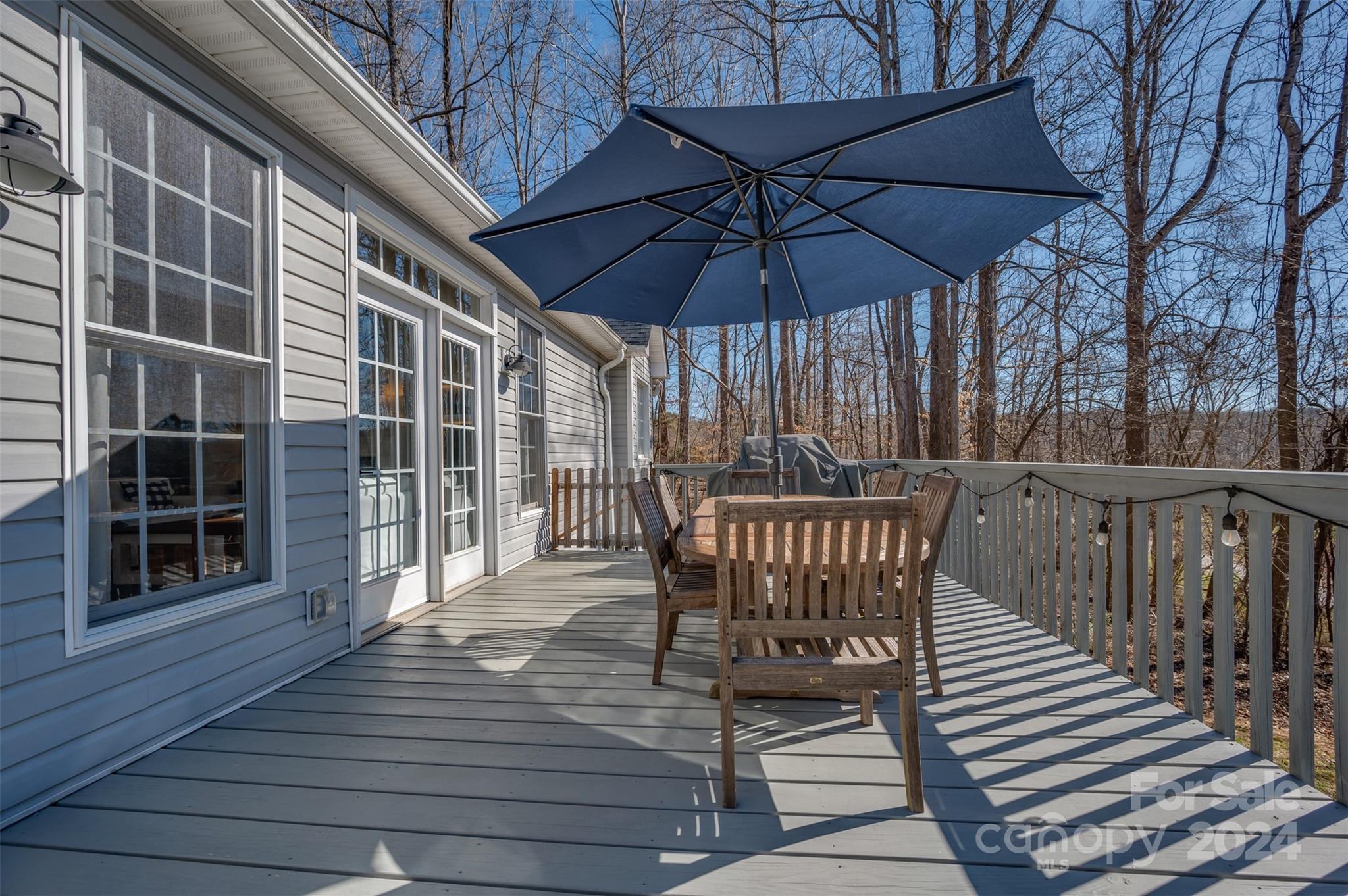 136 General Griffith Circle Rutherfordton, NC 28139 - Photo 25 of 47 a view of a roof deck with wooden floor and fence