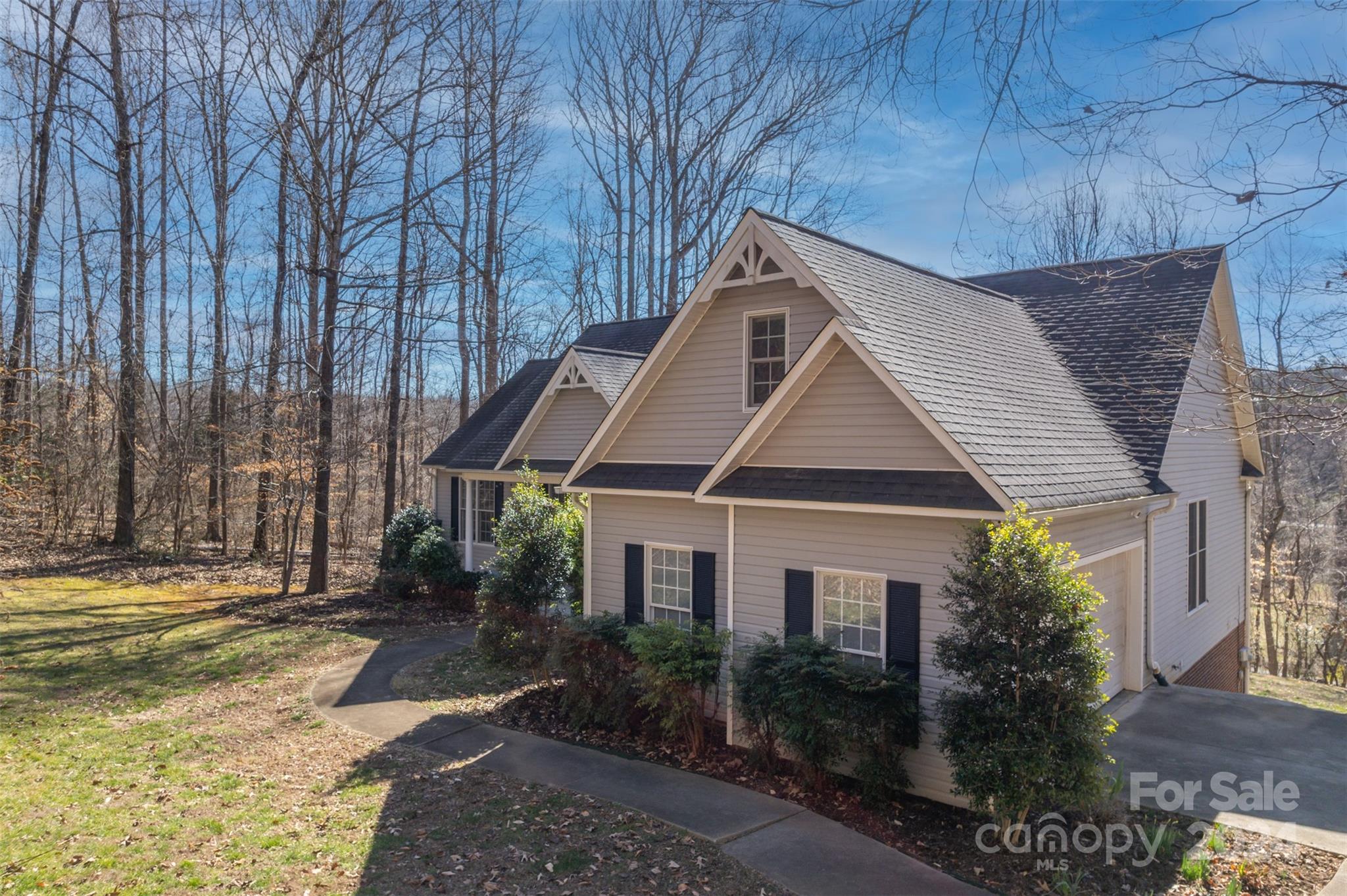 136 General Griffith Circle Rutherfordton, NC 28139 - Photo 3 of 47 a house view with a outdoor space