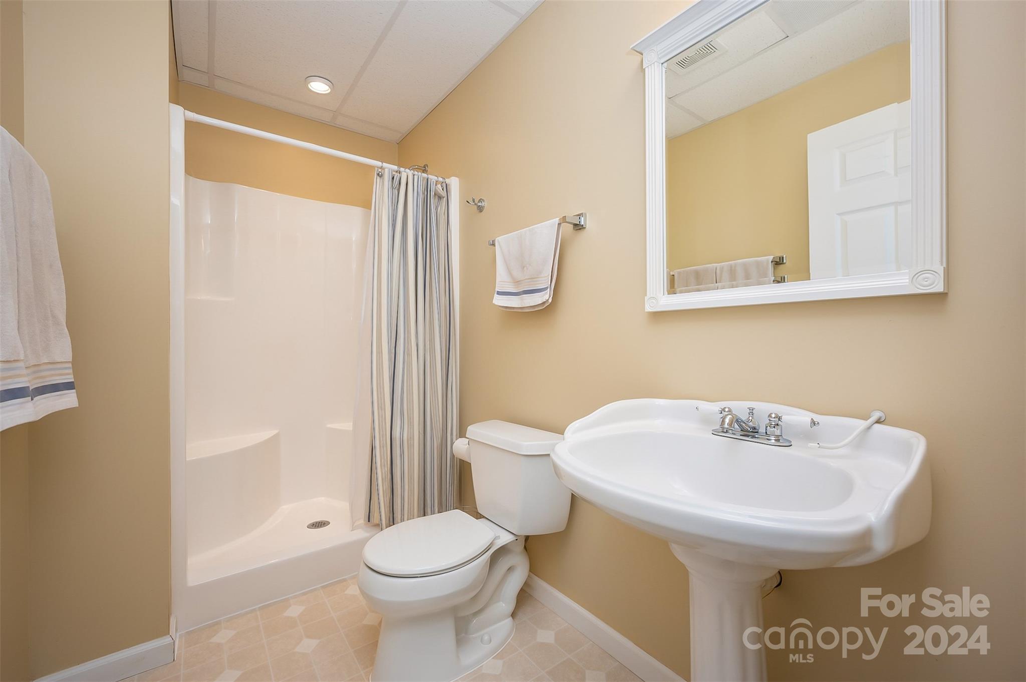 136 General Griffith Circle Rutherfordton, NC 28139 - Photo 32 of 47 a bathroom with a sink toilet and shower