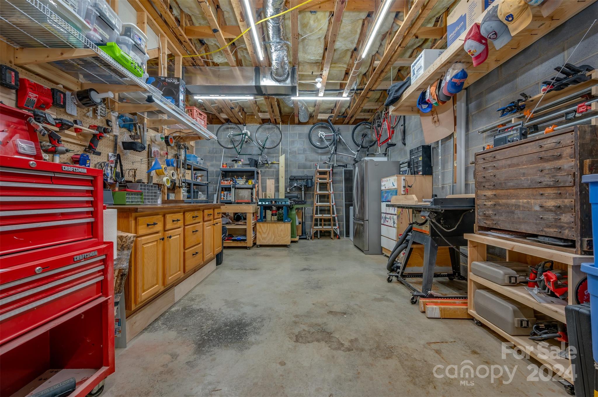 136 General Griffith Circle Rutherfordton, NC 28139 - Photo 35 of 47 a view of a storage room with a lot of stuff
