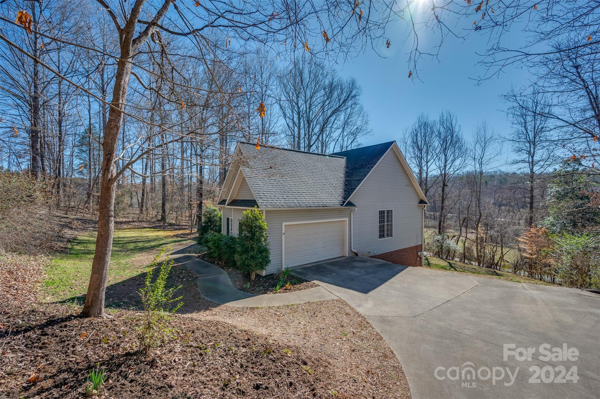 136 General Griffith Circle Rutherfordton, NC 28139 - Photo 37 of 47 a view of a house with a yard and large tree