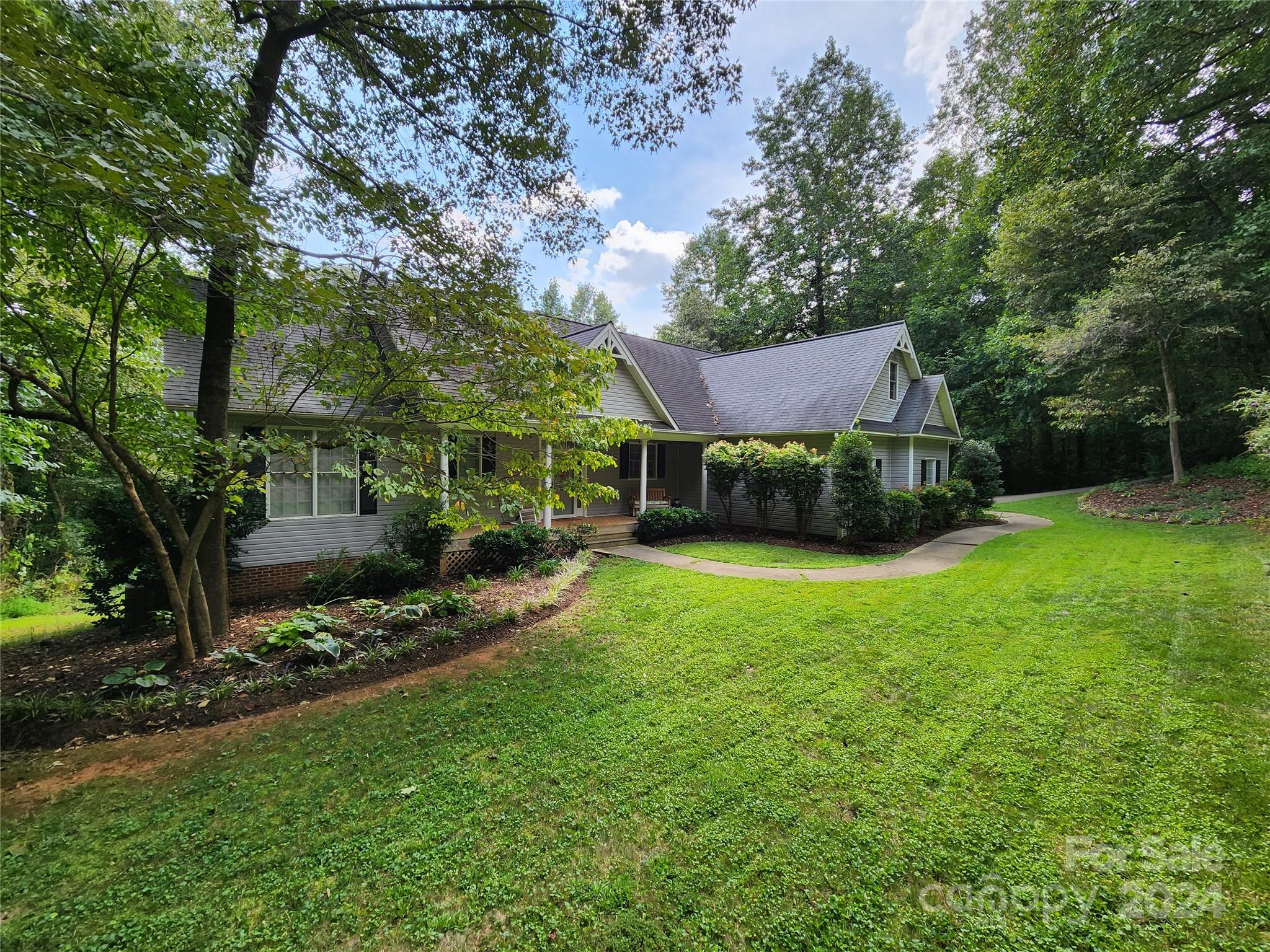 136 General Griffith Circle Rutherfordton, NC 28139 - Photo 4 of 47 a view of a house with a yard