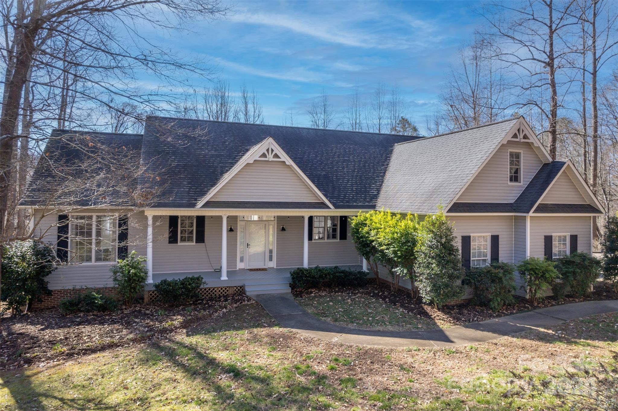 136 General Griffith Circle Rutherfordton, NC 28139 - Photo 42 of 47 front view of a house with a yard