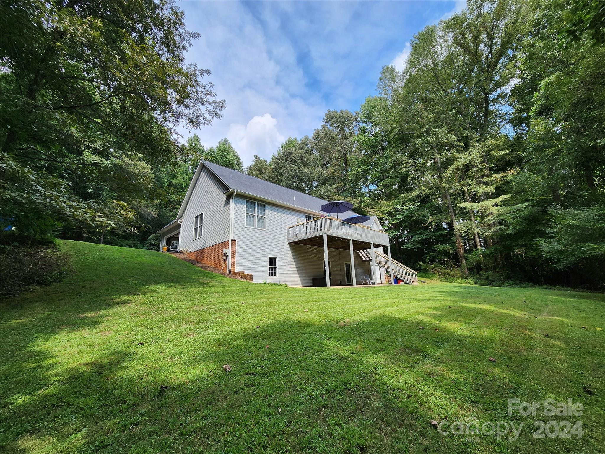 136 General Griffith Circle Rutherfordton, NC 28139 - Photo 47 of 47 a house view with a garden space