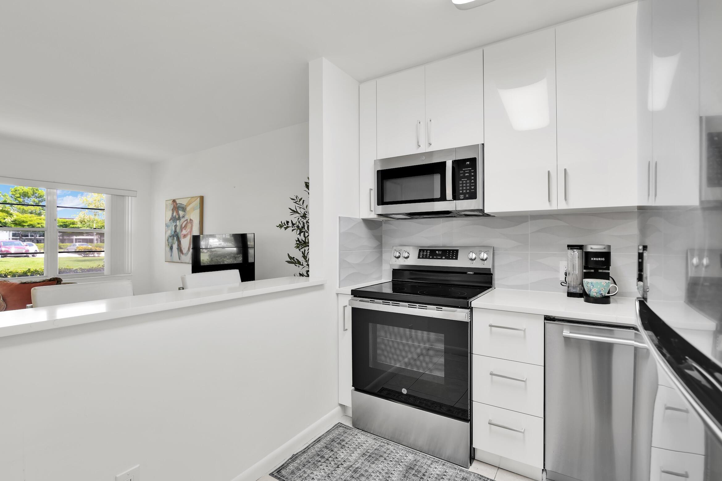 175 Fanshaw East Boca Raton, FL 33434 - Photo 1 of 26 Kitchen
