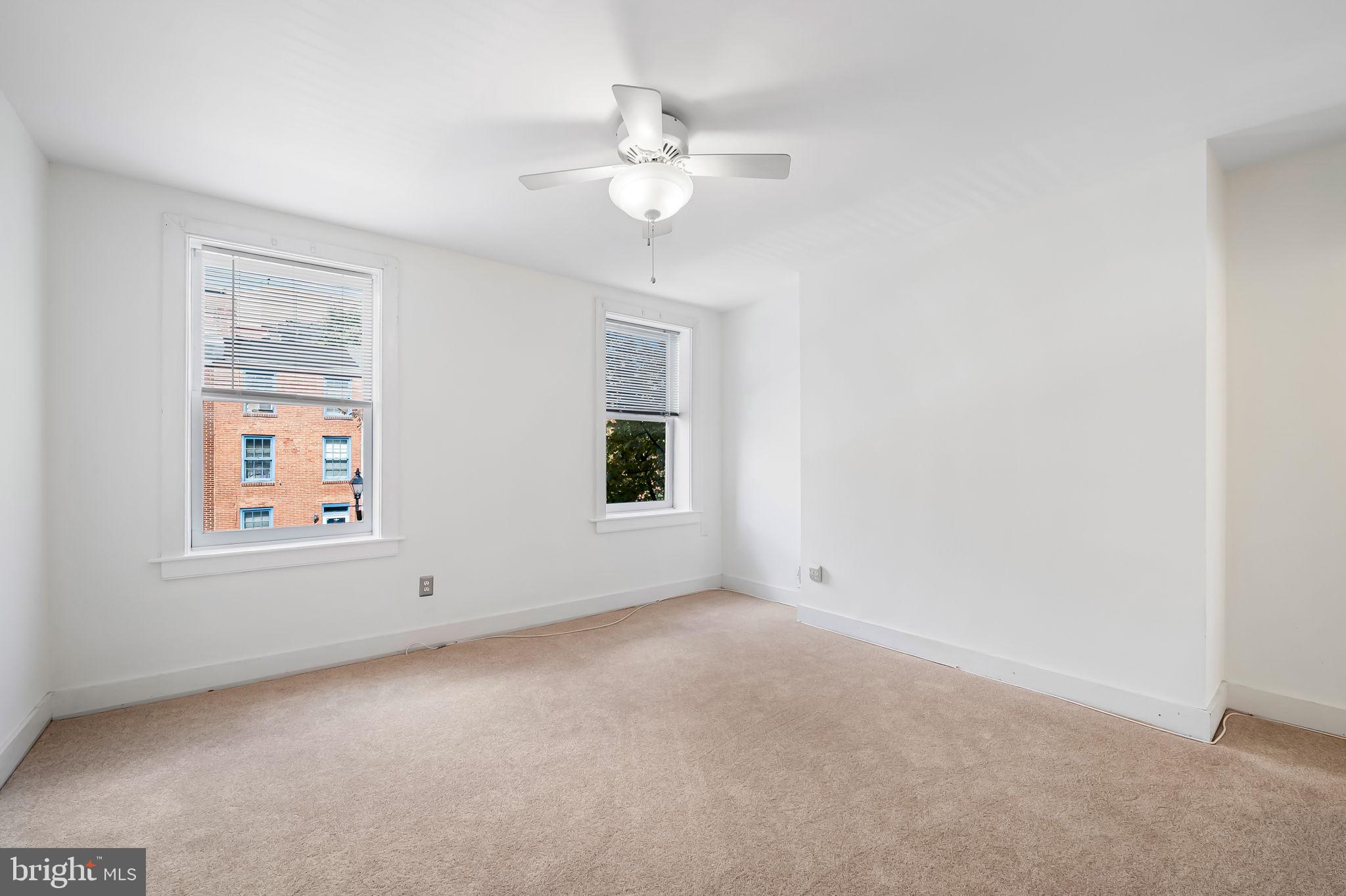649 Portland Street Baltimore, MD 21230 - Photo 13 of 34 an empty room with a window