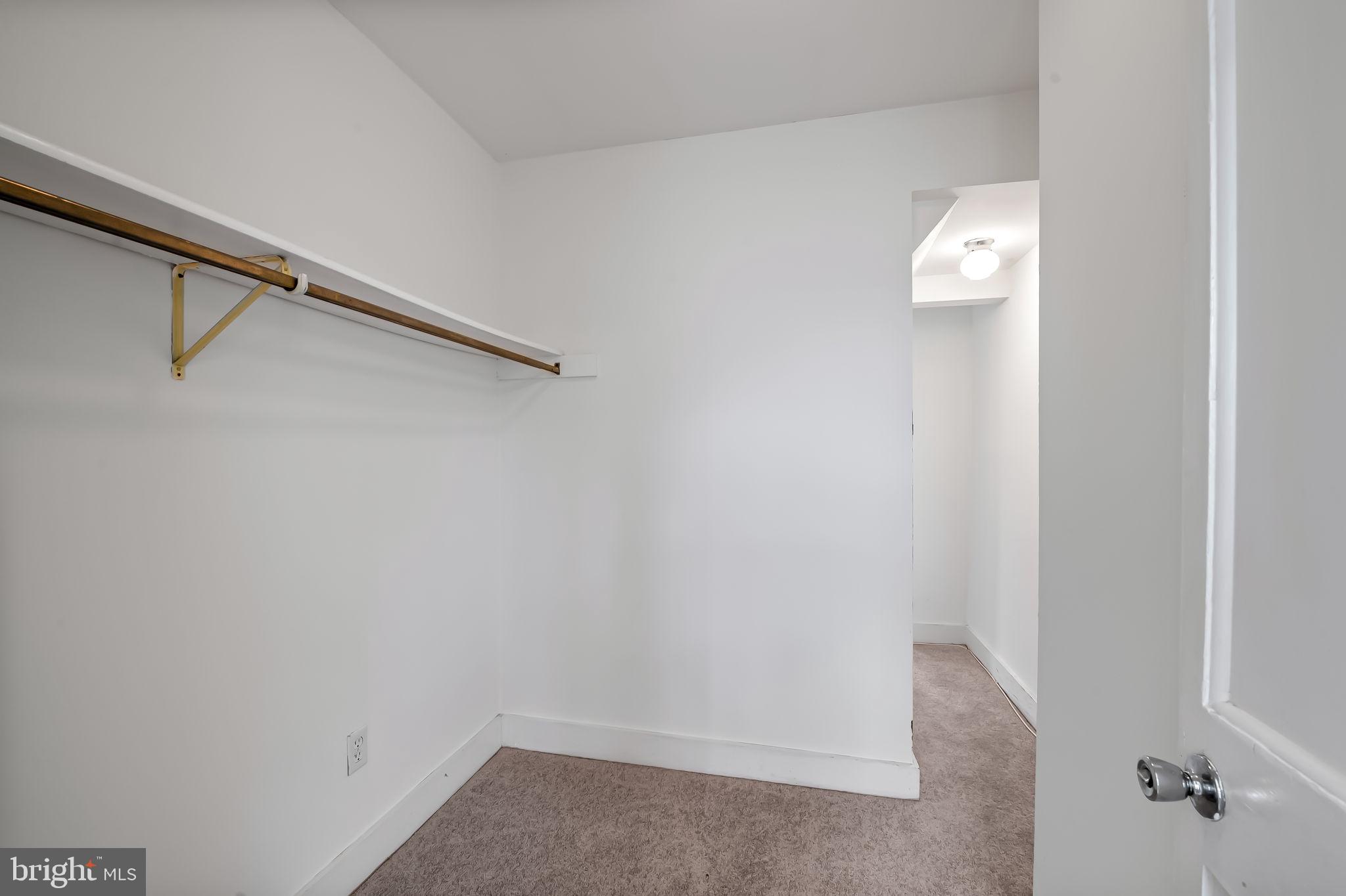 649 Portland Street Baltimore, MD 21230 - Photo 15 of 34 a view of a room with rack on the wall