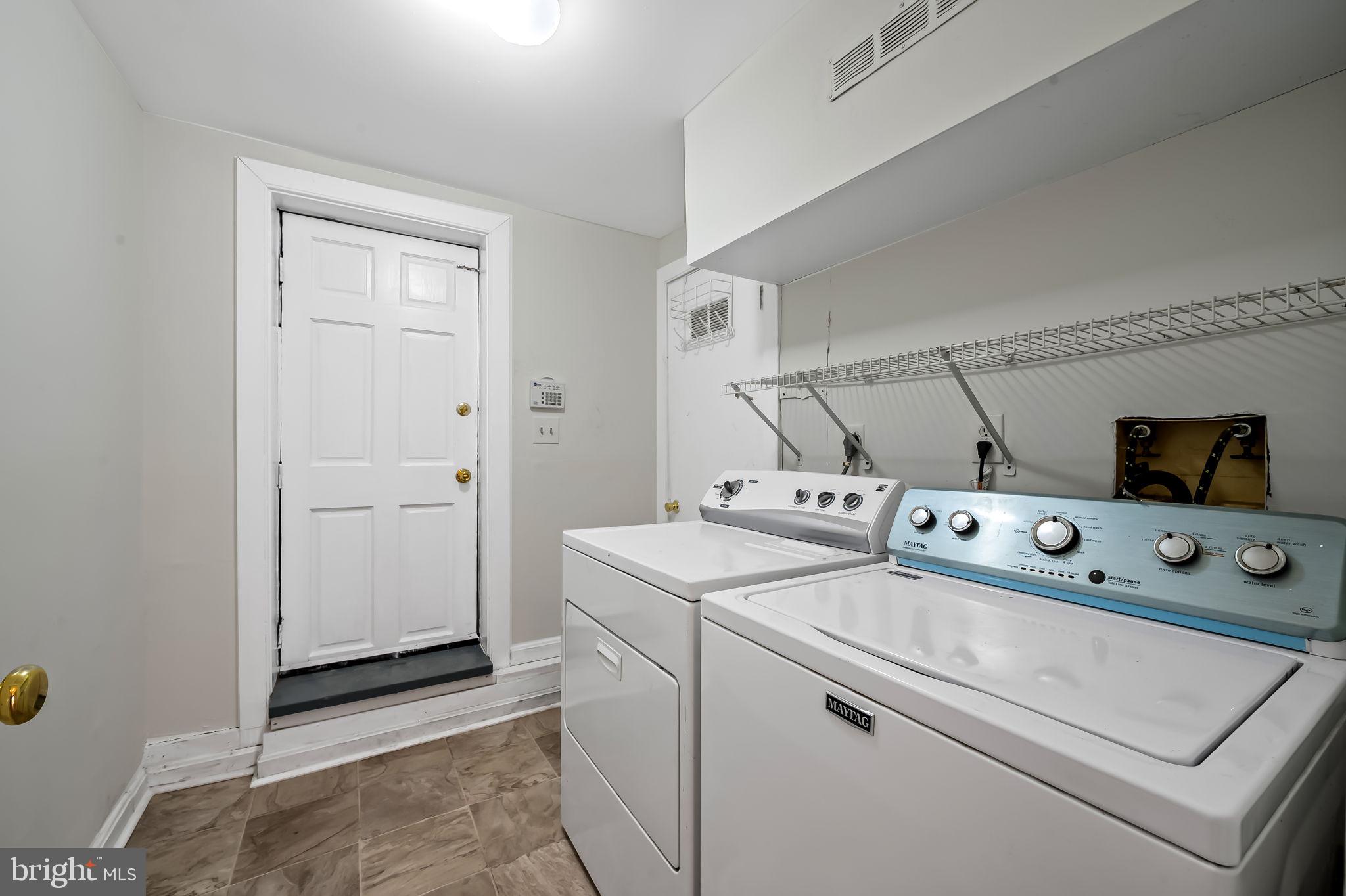 649 Portland Street Baltimore, MD 21230 - Photo 30 of 34 a utility room with dryer and washer