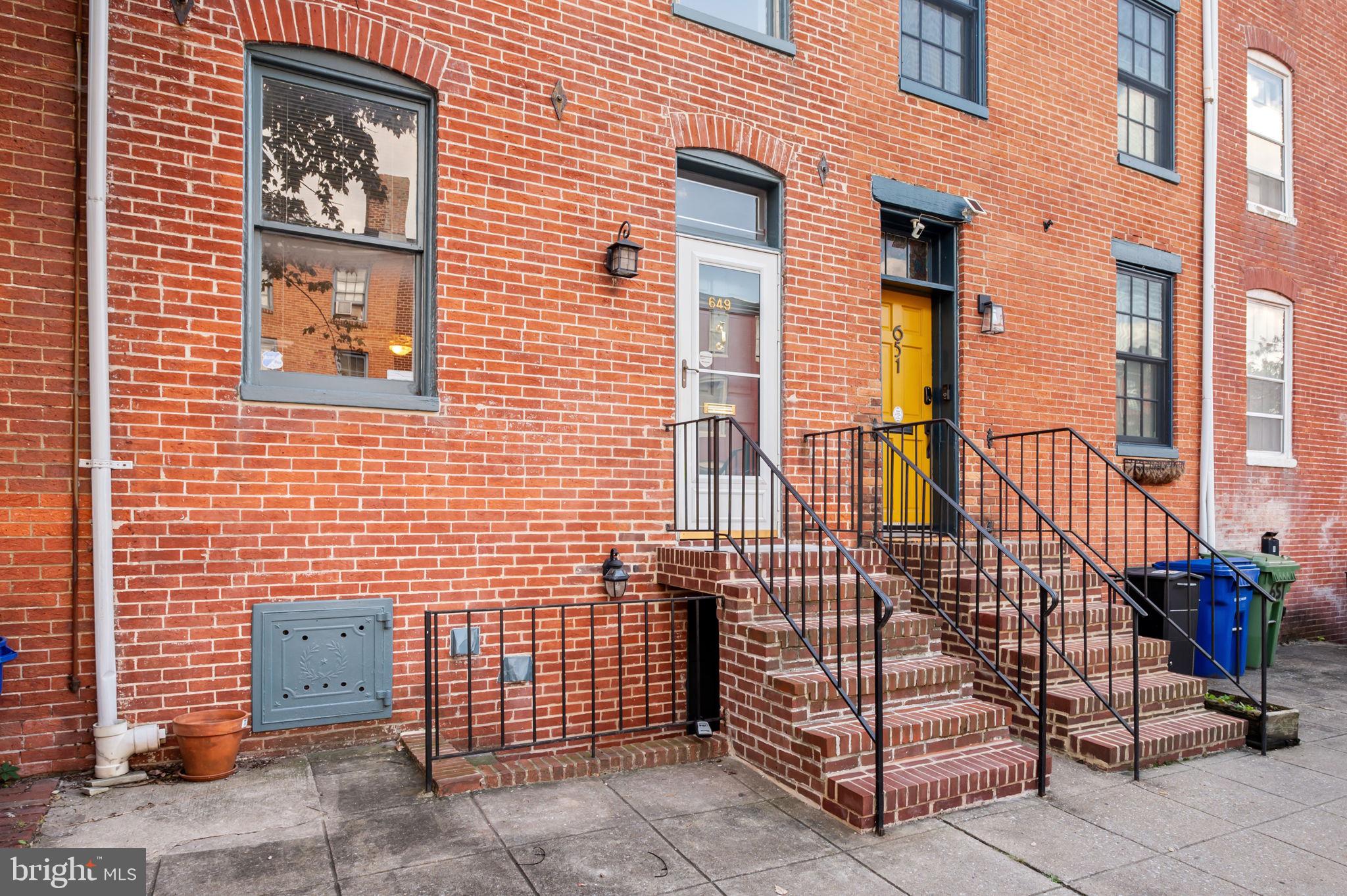 649 Portland Street Baltimore, MD 21230 - Photo 34 of 34 a view of a brick building with many windows