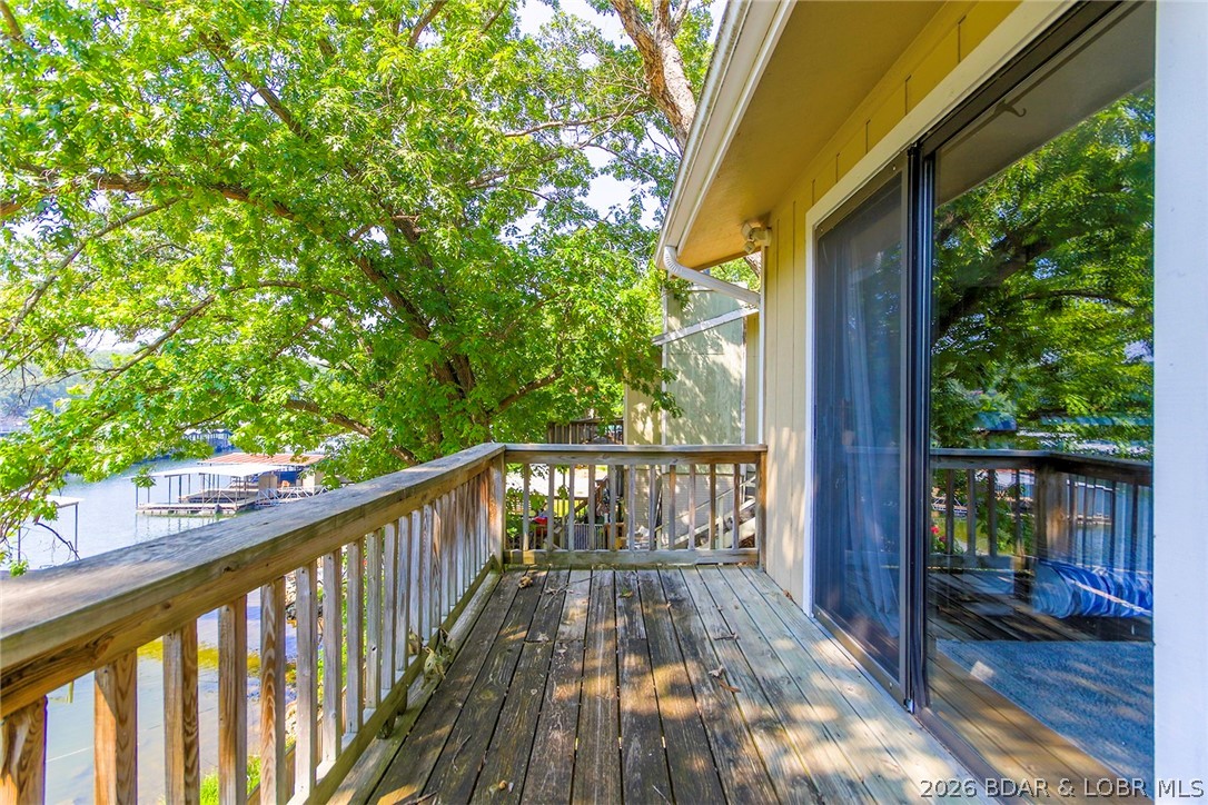 258 Northview Road Sunrise Beach, MO 65079 - Photo 12 of 35 Upper Level Deck services all 3 Bedrooms
