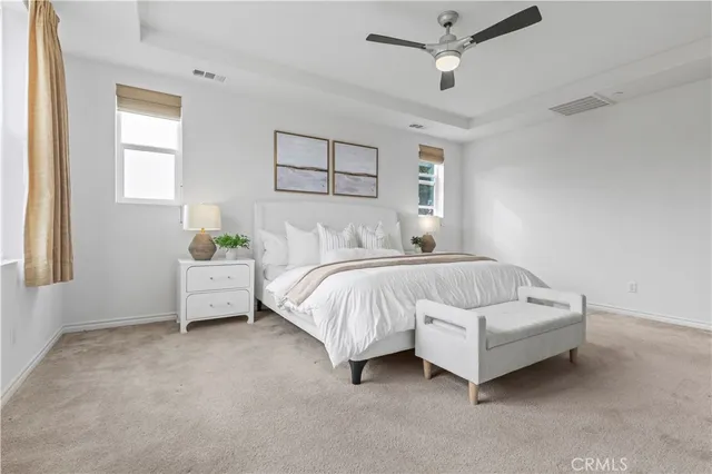 a bathroom with a bathtub sink and mirror