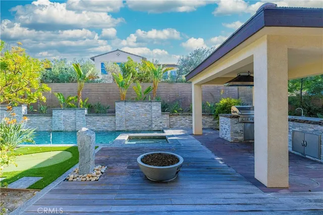 a view of a back yard of the house