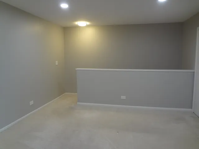 a bathroom with a sink vanity and a mirror