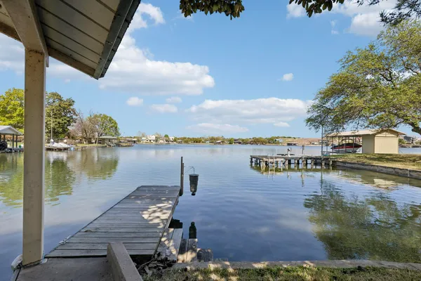 a view of a street with an ocean view