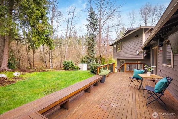 a view of house with backyard entertaining space