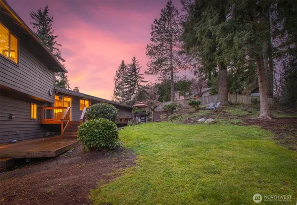 a backyard of a house with lots of green space