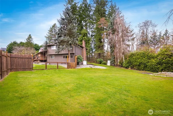 a view of a house with a big yard