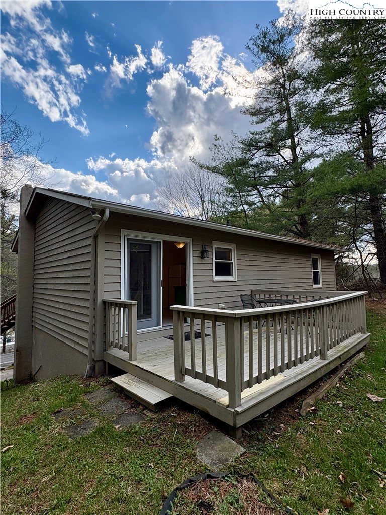 5416 Bamboo Road Boone, NC 28607 - Photo 27 of 35 a view of a house with a yard chairs and wooden fence