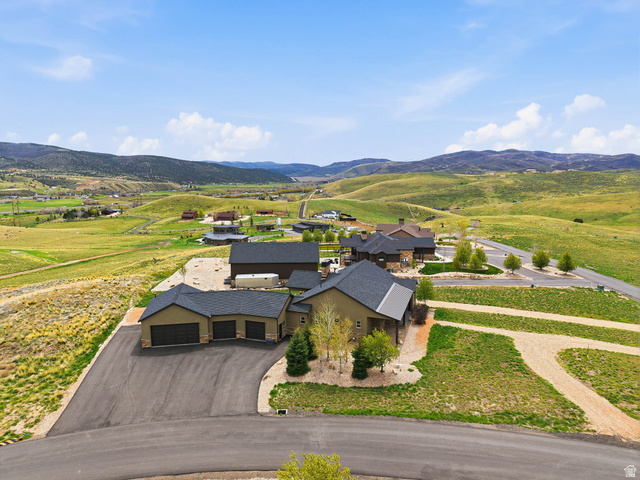 402 Shadow Hill Road Wanship, UT 84017 - Photo 85 of 90 Aerial view of a mountainous background