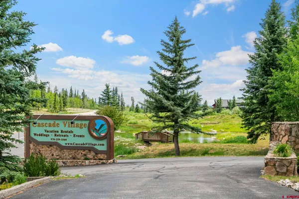 a view of a house with a mountain in the background