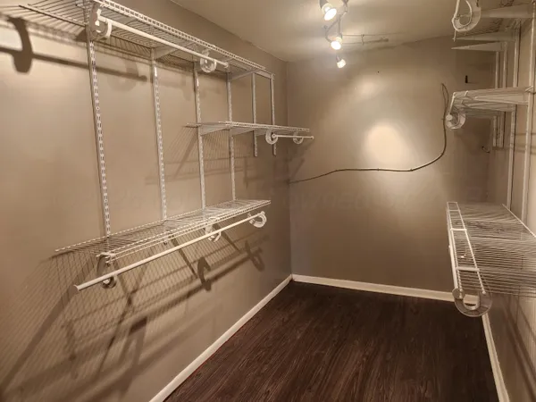 a view of a room with racks on the wall