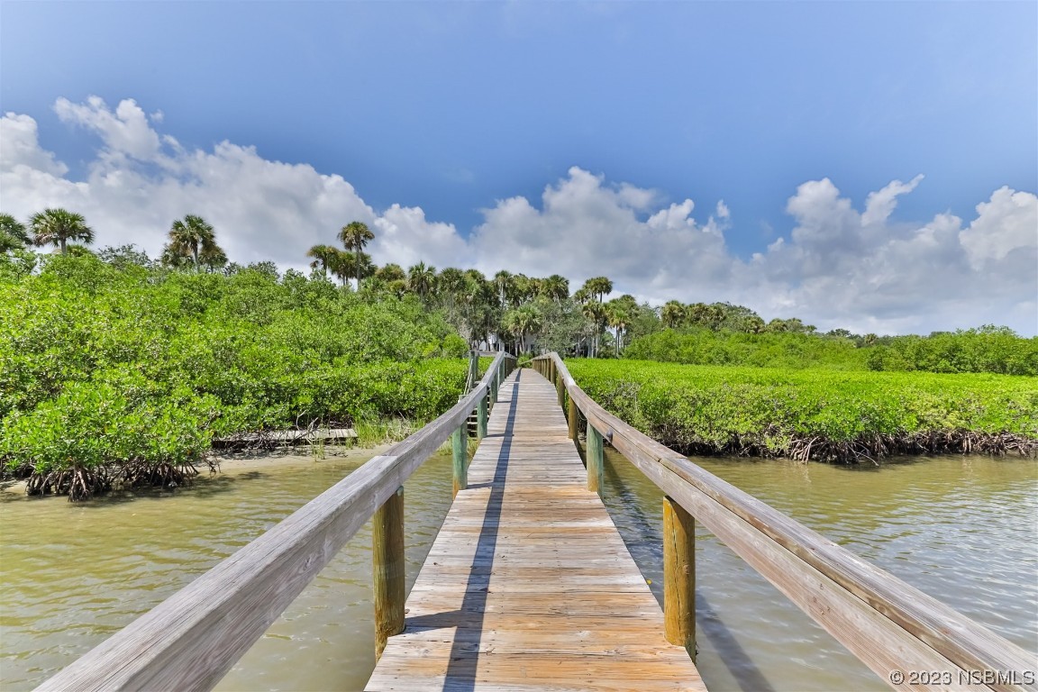 613 Portside Lane Edgewater, FL 32141 - Photo 42 of 49 a view of a lake from a balcony