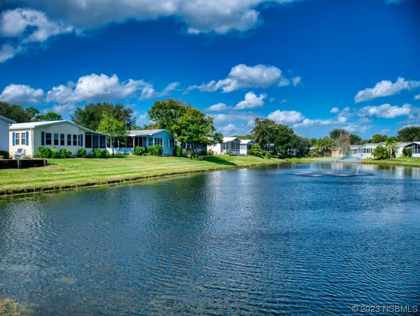 a view of a lake with houses