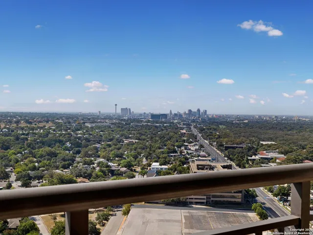 a view of a city from a balcony