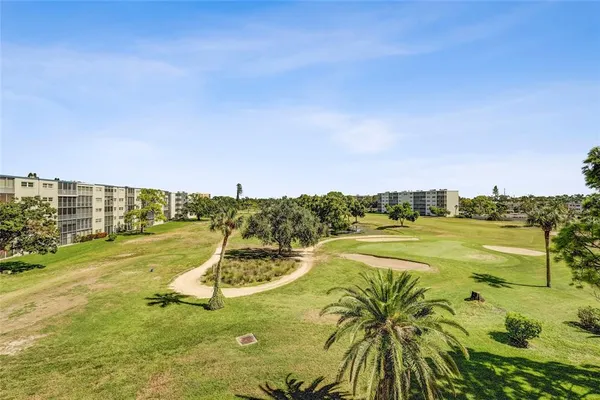 a view of a swimming pool with an ocean view