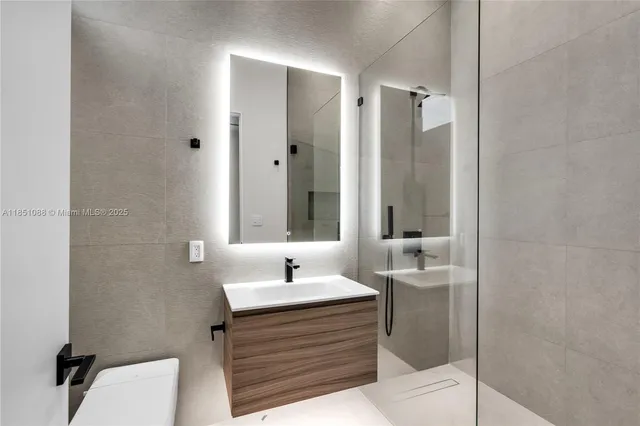 a view of walk in closet with rug