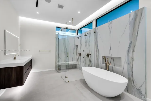 a view of backyard with swimming pool and outdoor seating