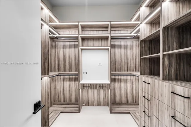 a view of house with backyard and balcony