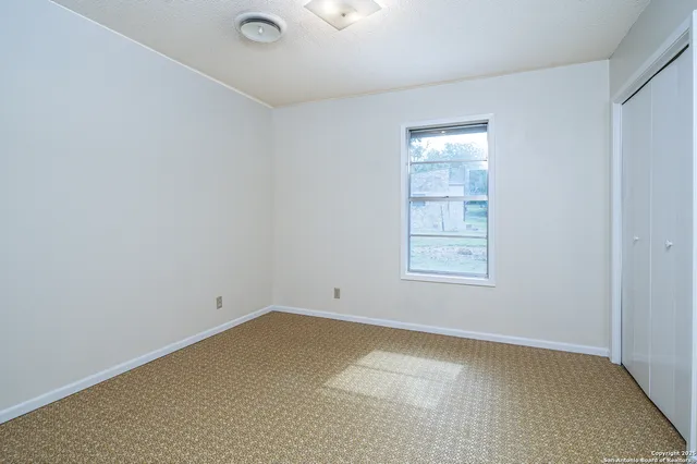 an empty room with a window