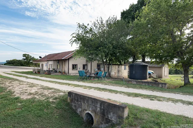 a view of a backyard with a trampoline