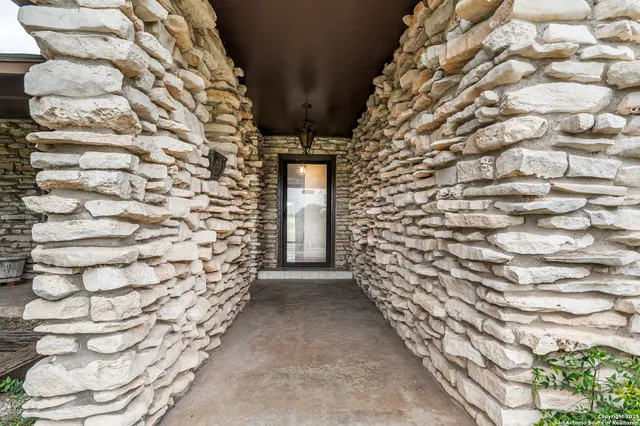 a view of an empty room with a street