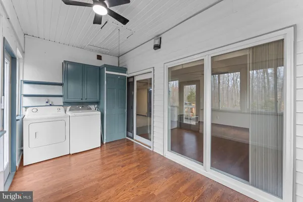 a view of outdoor space with deck and yard