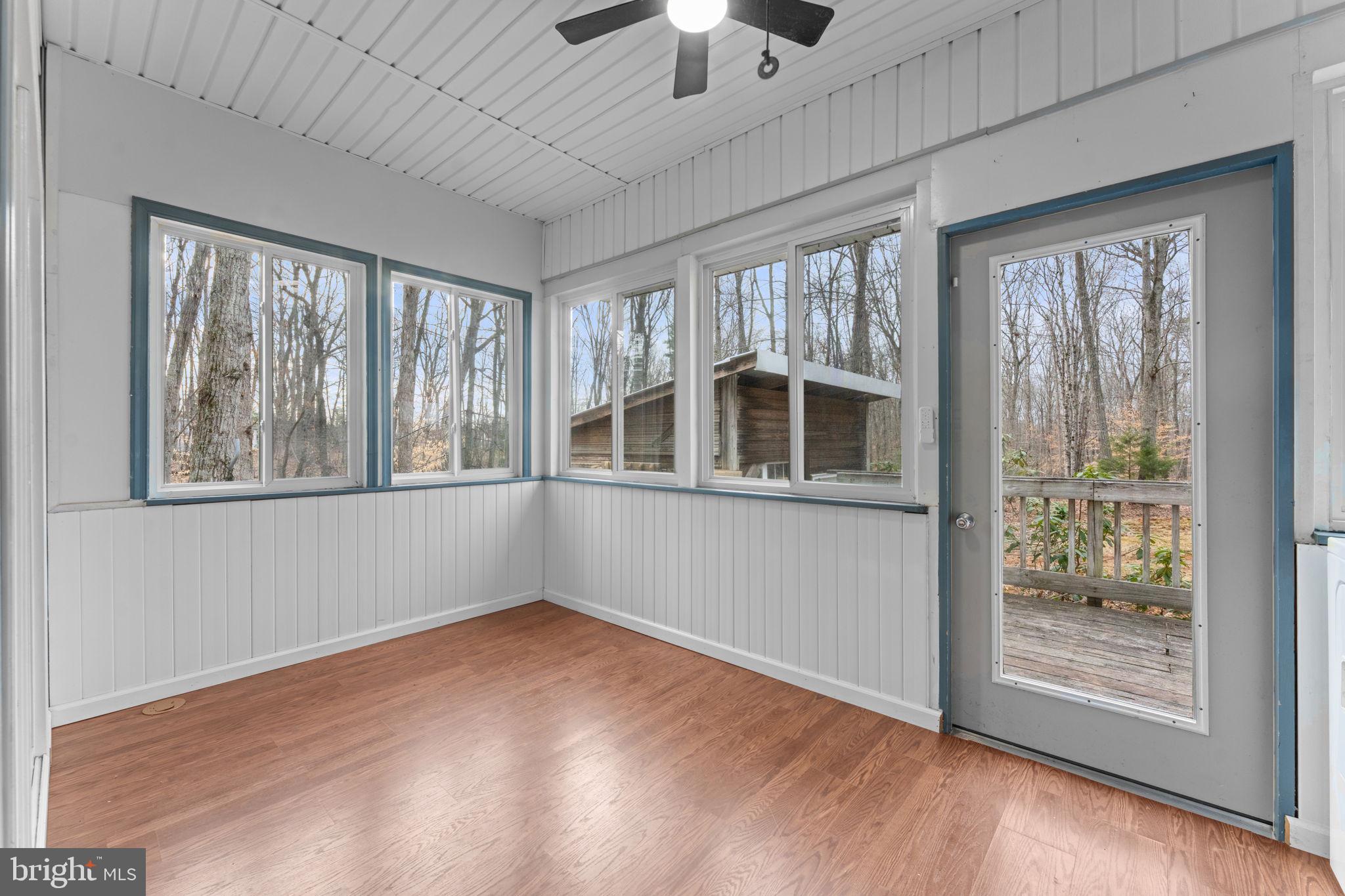 29082 Raccoon Ford Road Burr Hill, VA 22433 - Photo 47 of 78 Sunroom with Laundry.
Very pleasant.