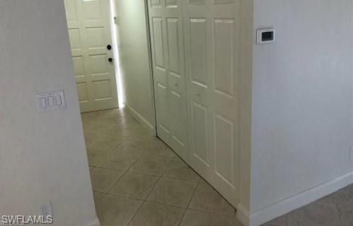 2096 Alamanda Drive, Unit 102 Naples, FL 34102 - Photo 20 of 23 a bathroom with a shower