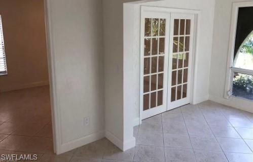 2096 Alamanda Drive, Unit 102 Naples, FL 34102 - Photo 6 of 23 a view of an entryway with workspace