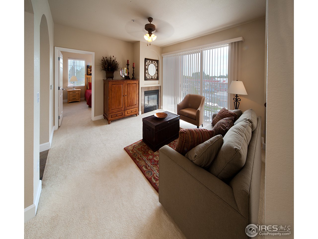 4500 Baseline Road, Unit 4104 Boulder, CO 80303 - Photo 6 of 11 a living room with furniture and a window