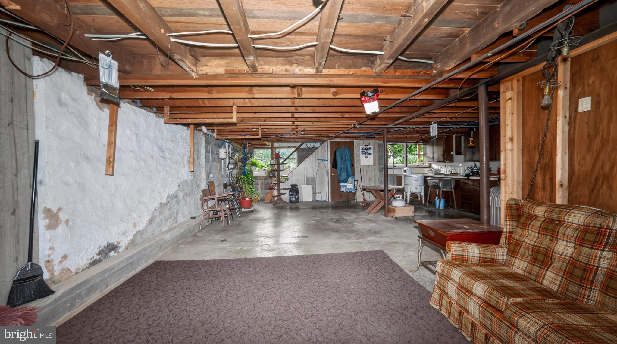 40 Queen Road Intercourse, PA 17529 - Photo 56 of 58 Spacious basement with rustic charm.